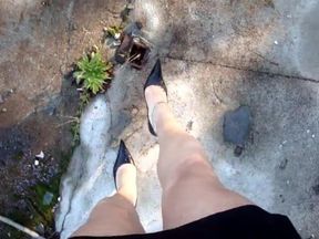 Joana V0mit Cd walking outdoors showing gorgeous legs