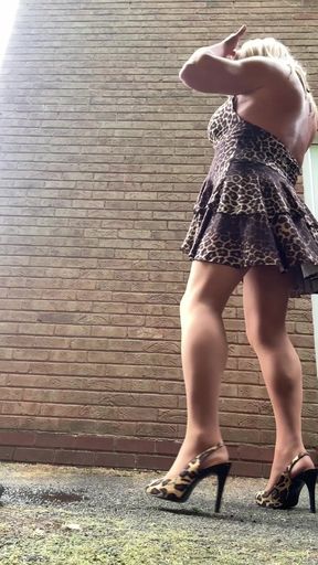 Sexy Crossdresser Kellycd2022 in Backless Leopard Print Dress and Heels in the Garden