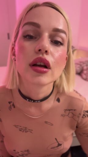 Blonde babe displays her collection of metal chastity belts