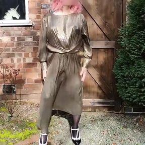 Hot crossdresser in gold metallic dress