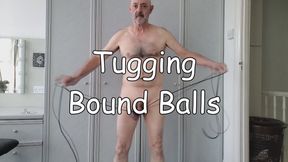 Tugging Bound Balls