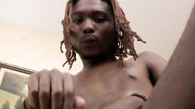 Slim black dude with a huge cock jerks off solo