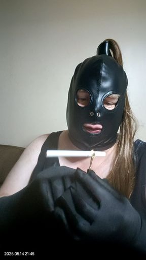 Smoking a slim cigarette on a ring holder