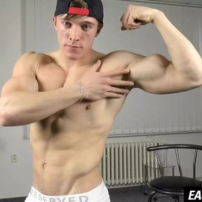 Handsome twink Larry McCormick flex his abs