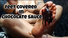Feet covered in chocolate sauce