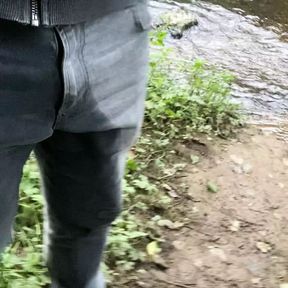 Walking into a river fully clothed and piss wet