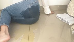 pee in blue jeans in the classroom