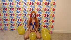 Clown pops balloons