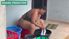 African Mama Multitasks on a Sunday Morning