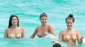 Cute Looking Young Nudists Walks On The Beach