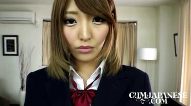 Young Japanese college girl in school uniform spreads for intimate close-ups