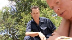 The husband observes his wife inserting a large phallus into her constricted vagina.