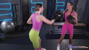 Mature Trainer Guides Young Beauty into Fierce Lesbian Gym Passion