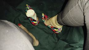Alicia crosses her legs to let her stiletto heels dangle from her feet (2)