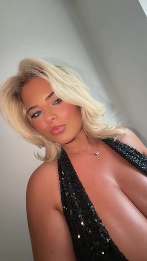 Curvy blonde with big tits poses in dress on TikTok (non-nude)