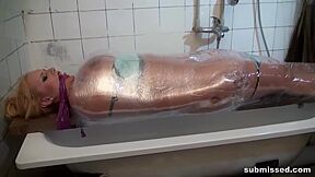 Wrapped In Plastic And Gagged