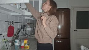 Reach high in the kitchen and belly showing 2 BB