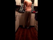 Pants slowly fall down while doing dishes