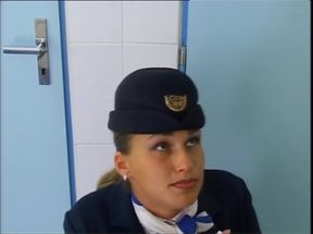Stewardess Pisses in Public Toilet Then Fucks a Big Cock That Cums in Mouth