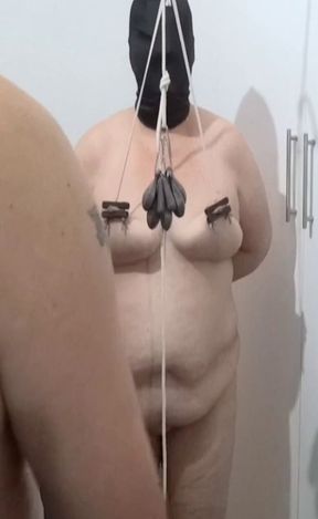 MaskedKinky - Slave slut tit torture, heavy weights stretching her nipples while shes spanked on her ass for disobedience