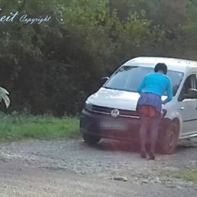 Outdoor car windows cleaning by the road