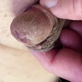 Showing off penis plug and taking it out