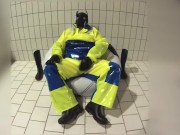 Pup pawing in Pros Extreme waterproof gear