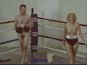 nude male vs female mixed naked boxing as with face punches, body punches and blow job ending