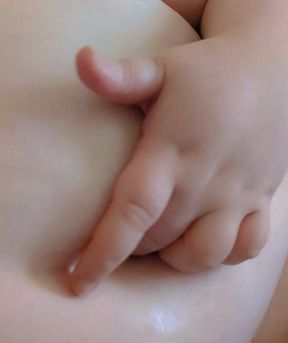 Close up of Oily Wet Belly Button Play