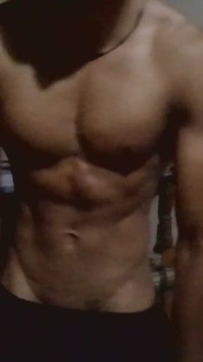 Showing His Abs and Core Area