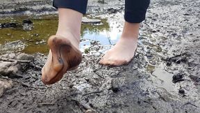 Muddy pantyhose, dirty feet, wet pantyhose feet, barefoot in mud