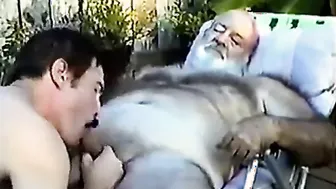 Hairy older daddy gets a blowjob from a young amateur