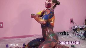 Kinky coed Lina is covered in paint