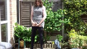 Thigh-booted Crossdresser Strokes Outdoors