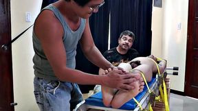 Diamond collectors have captured a thief who's been stealing diamonds from them. They've strapped him down on a rack and intend to tickle the cute young Asian boy until he breaks. They've got all day if necessary.