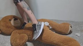Chrissy tramples big stuffy in cheetah shoes