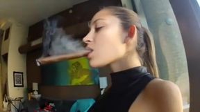 Dani Daniels smoking cigar strapon in leather