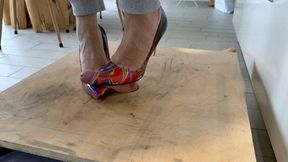 Multi coloured stiletto shoejob on cock table