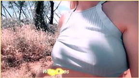 Sexy hiking wife exposes tantalizing cleavage on trekking route, beckoning randy hikers.