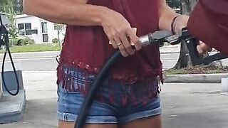 Jugs out at gas station