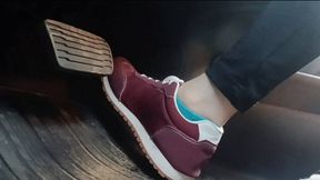 Evalynn driving a loaner truck in red sneakers 2