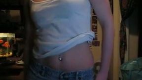 Cute teen strips in front of camera webcamming with me