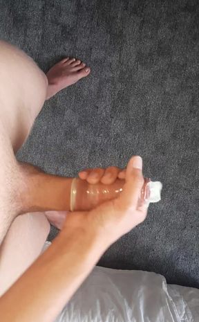 Jerking off in a condom