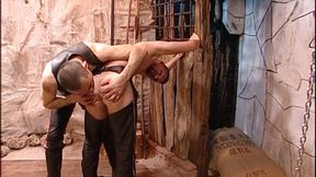 Bondage and spanking session in basement