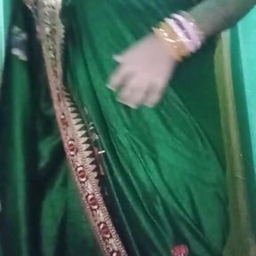 Indian Gay Crossdresser Gaurisissy in Green Saree Pressing Her Big Boobs and Fingering in Her Ass