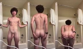 Hung very curly haired brunette shows off in the bathroom