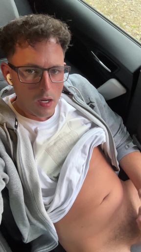 Really cute twink boy jerks off his stinky cheese-smeared penis outside in the car until he cums