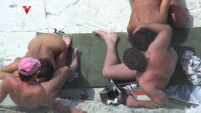 beach voyeur. swingers public beach foursome with hot wives sucking cocks