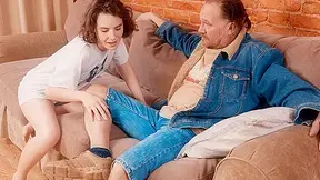 Curious man spies on a hot Darling relaxing on a couch