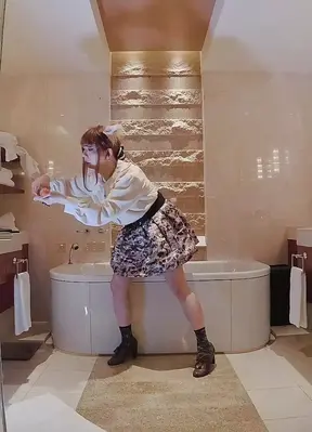 Japanese crossdresser with rabbit ear cum in a luxury hotel bathroom. cumdrop.